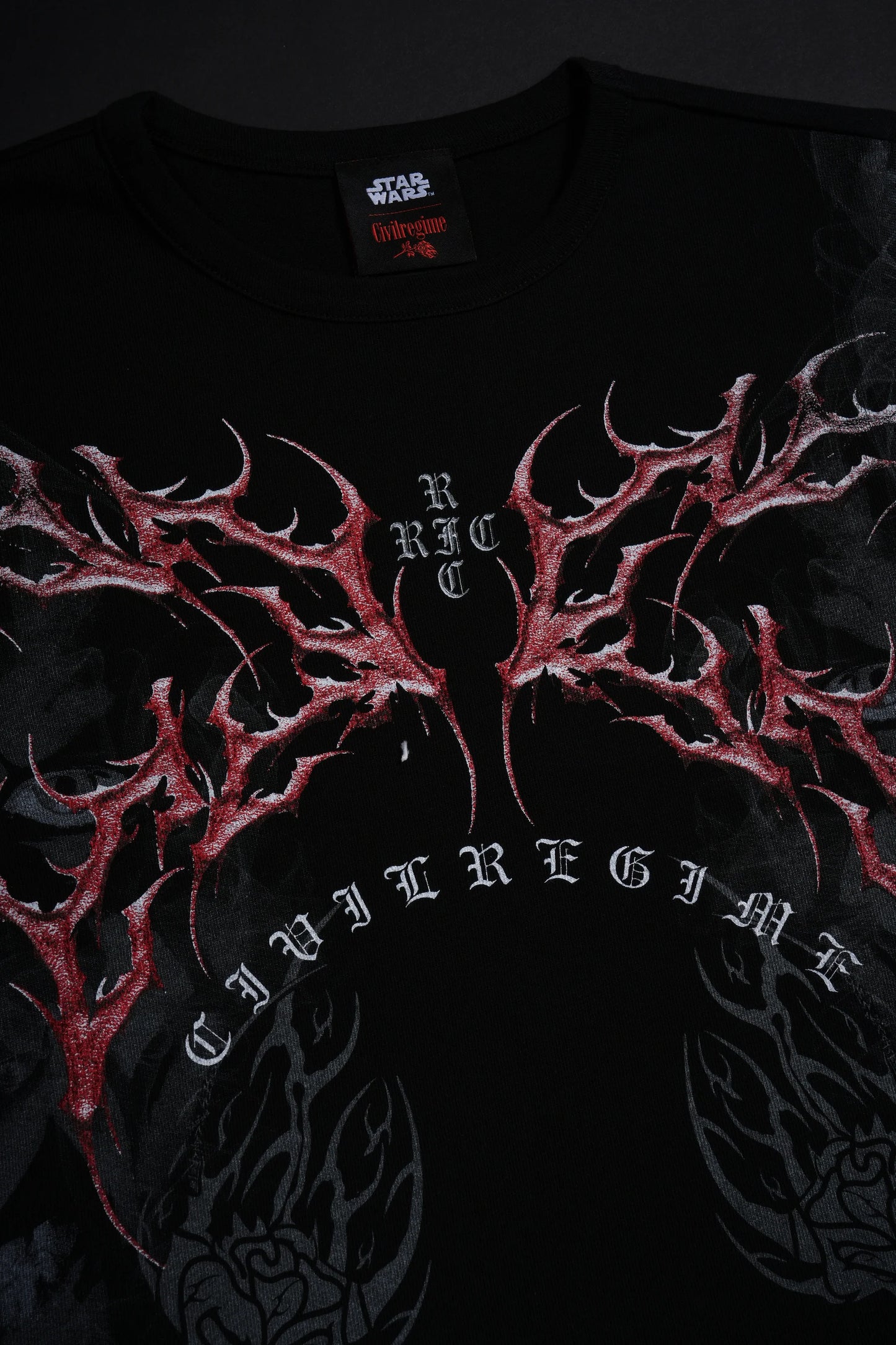 Scarlet Vengeance Baby Tee in Black