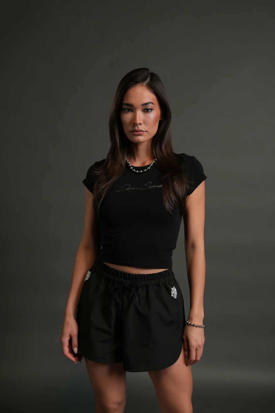 DARC STAR BABY TEE IN BLACK