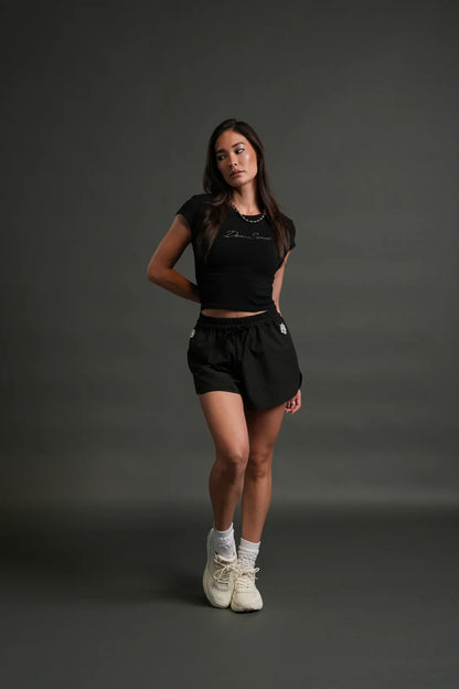 DARC STAR BABY TEE IN BLACK