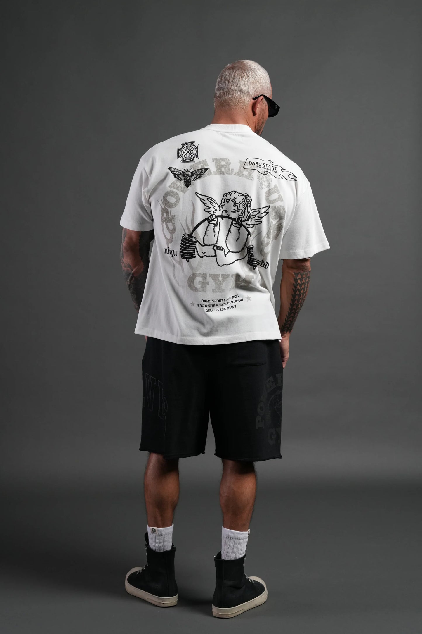 Powerhouse of the Cherub Unisex Premium Oversized Tee in Cream