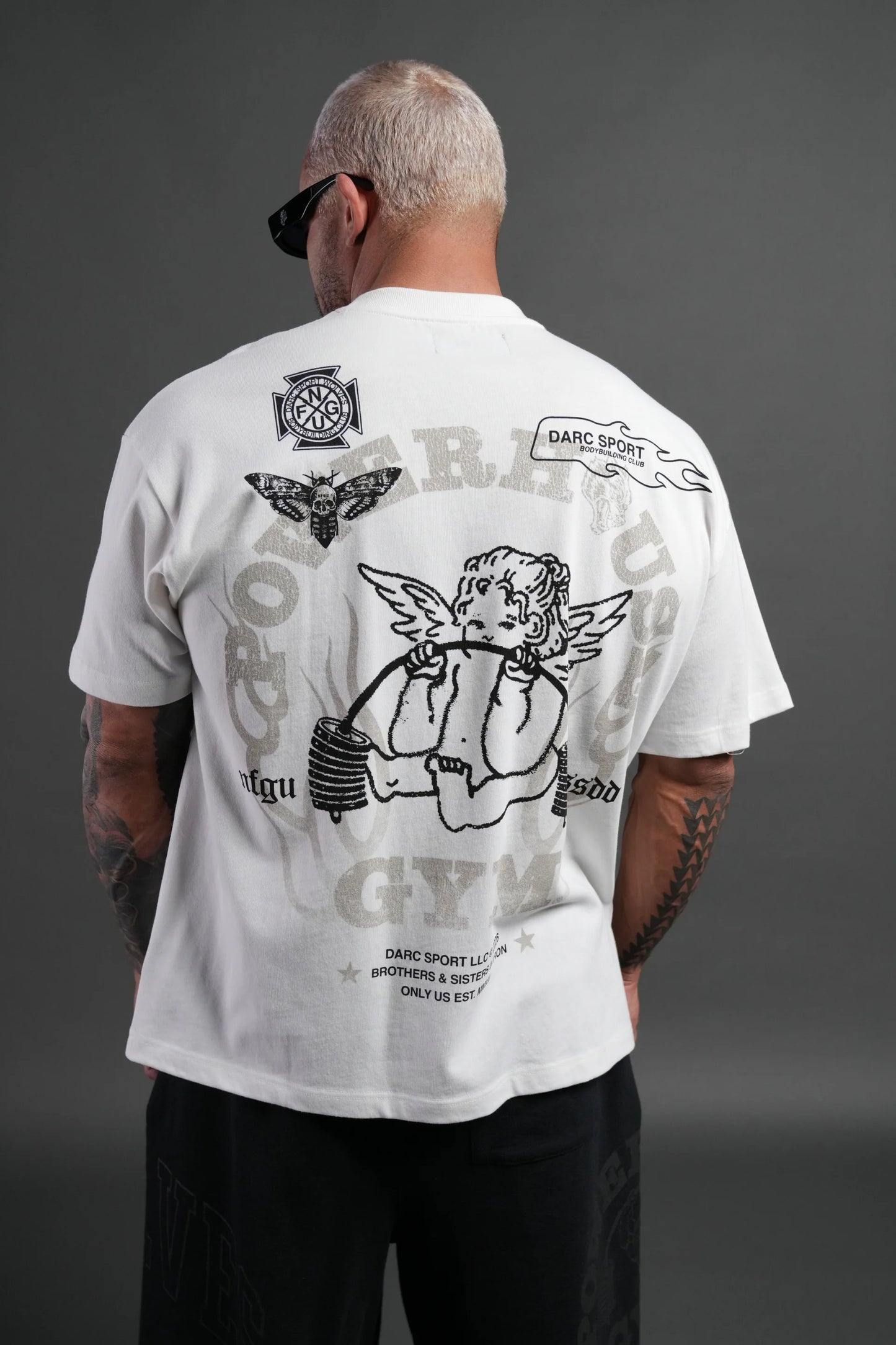 Powerhouse of the Cherub Unisex Premium Oversized Tee in Cream