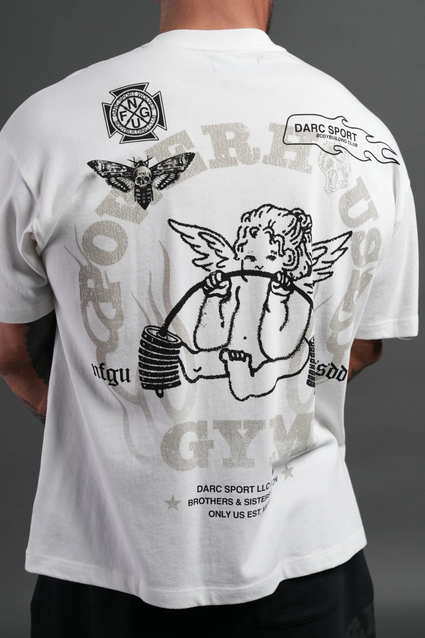 Powerhouse of the Cherub Unisex Premium Oversized Tee in Cream