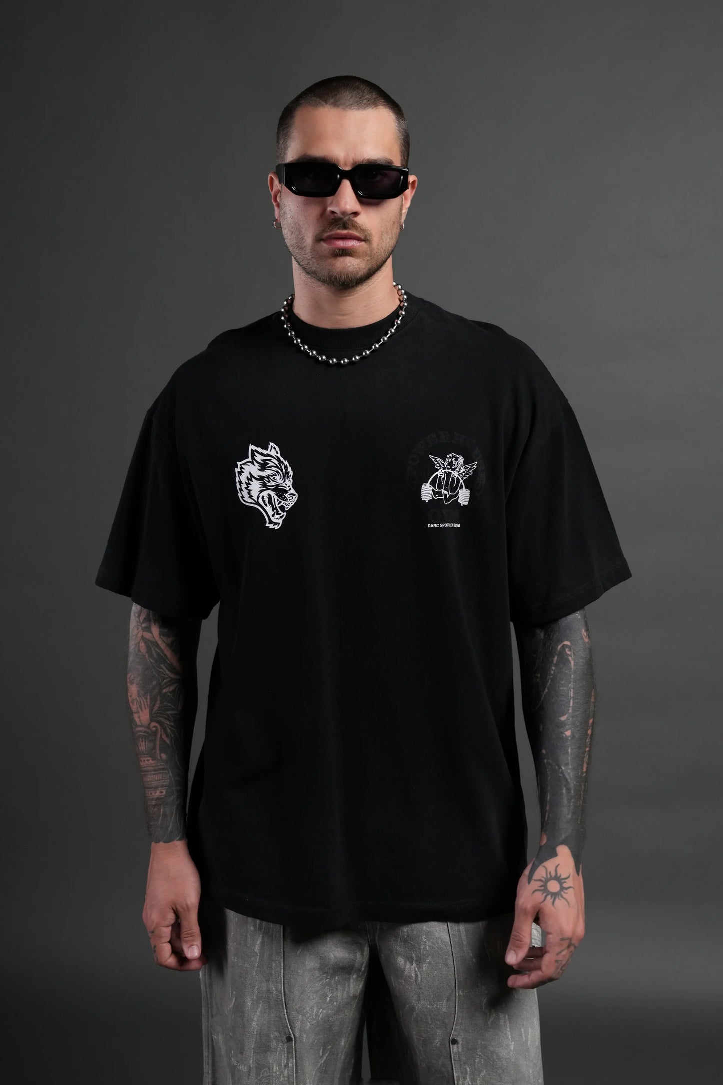 Powerhouse of the Cherub Unisex Premium Oversized Tee in Black Drift Wash