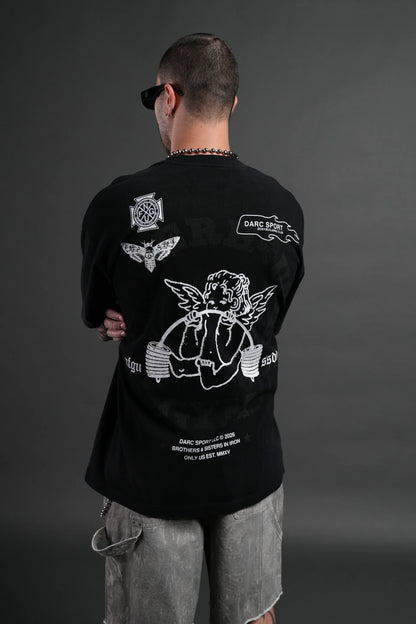 Powerhouse of the Cherub Unisex Premium Oversized Tee in Black Drift Wash