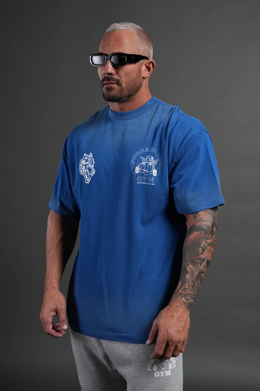 Powerhouse of the Cherub Unisex Premium Oversized Tee in Darc Cobalt Drift Wash