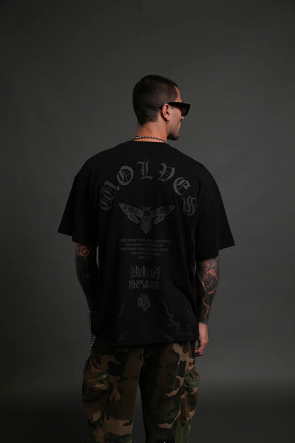 WOLVES NEVER BACK DOWN PREMIUM OVERSIZED TEE IN BLACK