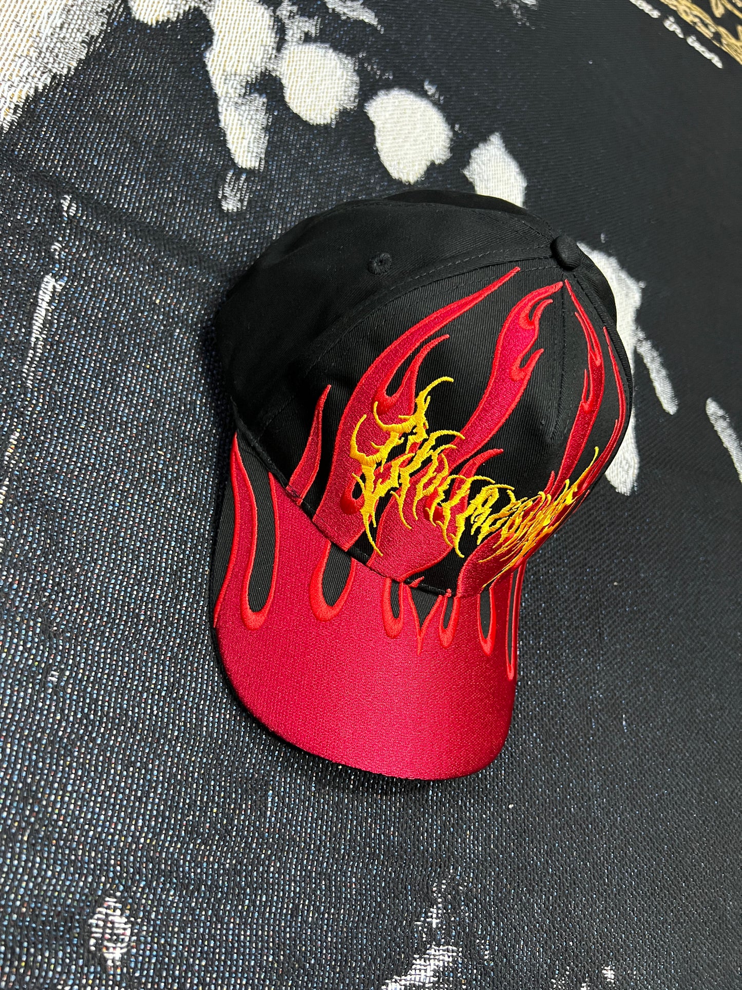 SHADOW IN THE FLAMES 5 PANEL STRAPBACK HAT IN BLACK