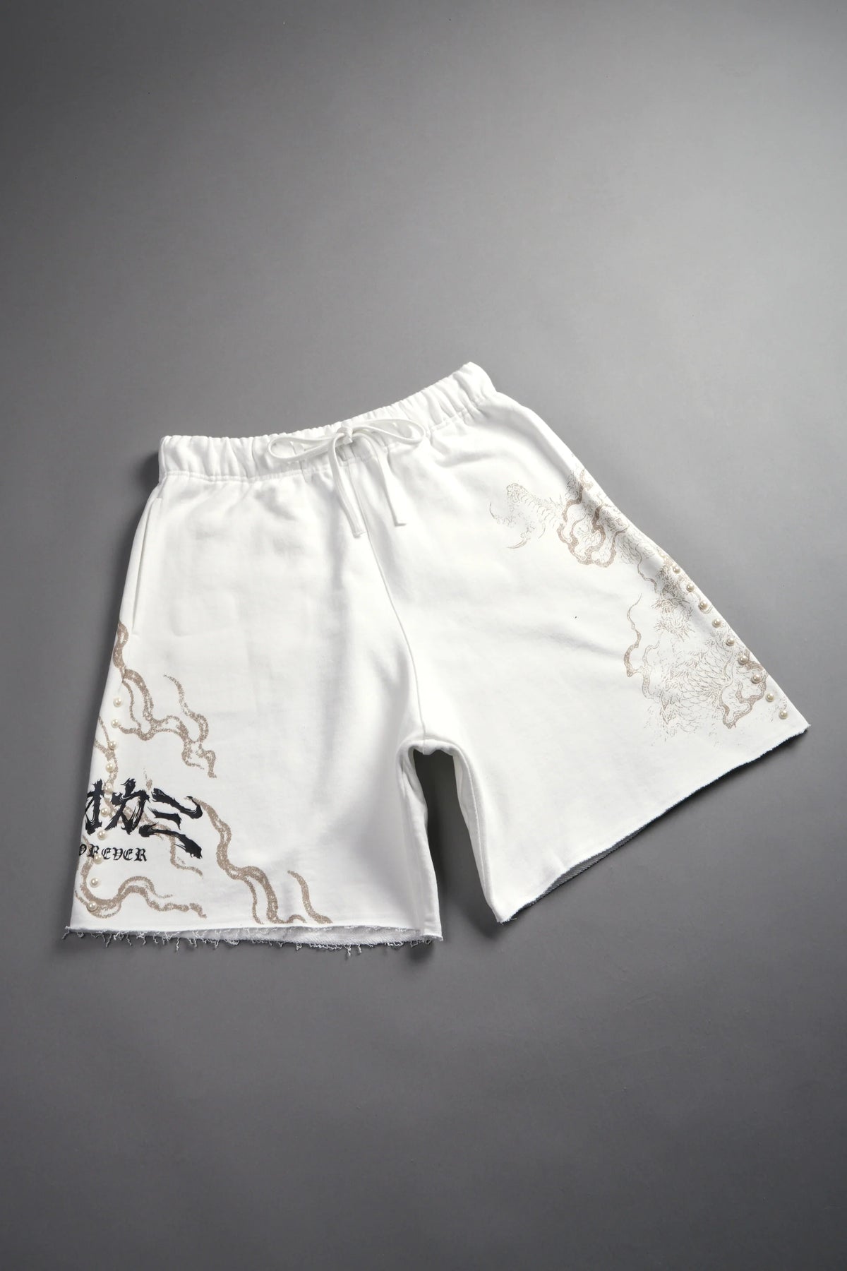 Kokuryu Grunge Oversized Raw Hem Post Lounge Sweat Shorts in Cream