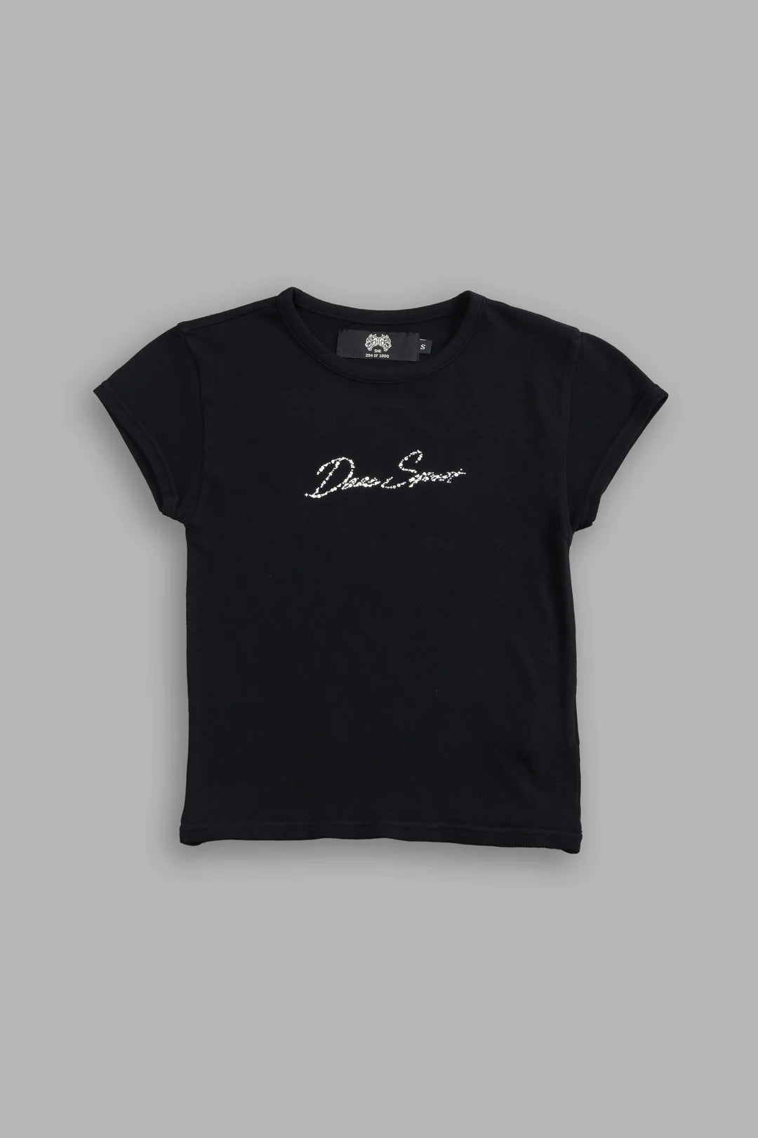 DARC STAR BABY TEE IN BLACK